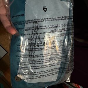 Lululemon Teal and Gold Crossbody Bag